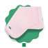 Folded pink  knit newborn blanket on a green scalloped mat with 'MIMI' brand logo